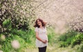 Beautiful pregnant woman relaxing in the park Royalty Free Stock Photo