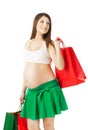 Beautiful pregnant woman with shopping bags Royalty Free Stock Photo