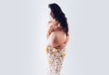 Beautiful pregnant woman in spring flower skirt. womens health. girl with big belly. life birth expectation. Love