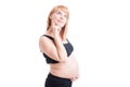 Beautiful pregnant woman thinking wondering or day-dreaming with Royalty Free Stock Photo