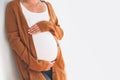 Close-up pregnant woman touching her belly. Mother anticipation Royalty Free Stock Photo