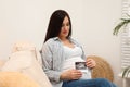 Beautiful pregnant woman with ultrasound photo of her baby Royalty Free Stock Photo