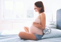 Beautiful pregnant woman waiting of a baby. Royalty Free Stock Photo