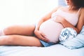 Beautiful pregnant woman waiting of a baby. Royalty Free Stock Photo