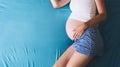 Beautiful pregnant woman waiting of a baby. Royalty Free Stock Photo