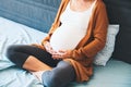 Beautiful pregnant woman waiting of a baby. Royalty Free Stock Photo