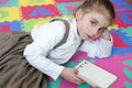 Beautiful preschooler girl studying book Royalty Free Stock Photo