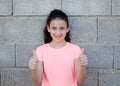 Beautiful preteen girl with blue eyes saying Ok Royalty Free Stock Photo