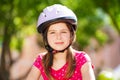 Beautiful preteen girl in safety helmet