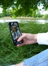 Beautiful pretty girl, young woman or lady taking photo, picture of herself, posing, shooting a selfie for social media Royalty Free Stock Photo