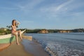 Beautiful pretty woman sitting at the boat on the beach in Weligama Royalty Free Stock Photo