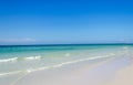 Beautiful pristine beach surrounded by blue sky Royalty Free Stock Photo