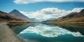 Beautiful pristine mountain landscape reflected in a still lake. Mirror reflection of national park scenery and sky. Royalty Free Stock Photo