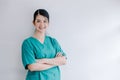 The beautiful professional nurse standing with her arms crossed and looking straight at the camera with a happy smiling Royalty Free Stock Photo