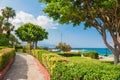 Beautiful promenade with green trees in Kemer, Turkey.