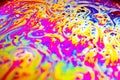 Beautiful psychedelic abstraction formed by light on the surface of a soap bubble Royalty Free Stock Photo