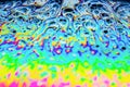 Beautiful psychedelic abstraction formed by light on the surface of a soap bubble