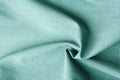 Beautiful pure organic cotton fabric laid out in concentric spiral pattern. Elegant greenish gray color delicate weave. Sewing