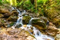 Beautiful pure waterfall in Slovakia national park Mala Fatra - Janosikove Diery, near the Terchova village. Fresh water stream on