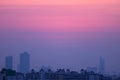 Beautiful purple blue sunset sky over the high buildings of Bangkok suburb, Thailand Royalty Free Stock Photo