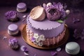 Beautiful purple cake decoraited of fresh flowers, macaroons and meringue.