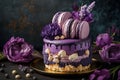 Beautiful purple cake decoraited of fresh flowers, macaroons and meringue.