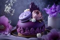 Beautiful purple cake decoraited of fresh flowers, macaroons and meringue.