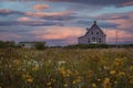 Purple house at Magdalen islands in canada during sunset