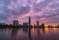 Beautiful purple and orange cloudy sunset at the city pond of Yekaterinburg, Russia