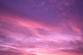 Beautiful purple pink sunset. Evening sky with clouds. Royalty Free Stock Photo