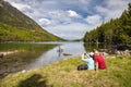 Beautiful Pyrenees mountain landscape, nice lake with tourist couple from Spain, Catalonia