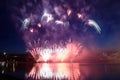 Pyrotechnic fireworks show in the night sky.