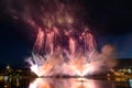 Pyrotechnic fireworks show in the night sky.