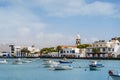 Beautiful quay with historic architecture and boats on blue water in Arrecife, Lanzarote, Canary Islands, Spain