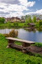 Beautiful quiet lake with a wooden gazebo in a rural cottage village. Country holiday. Pleasant weekend in nature Royalty Free Stock Photo