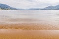 Beautiful quiet morning on the Canadian lake beach with yellow sand