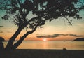 Beautiful quiet tropical sunset over bottle beach