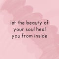 A beautiful quote, "Let the beauty of your soul heal you from inside" isolated on soft pink painting brush background. Royalty Free Stock Photo
