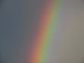 A beautiful rainbow against of a gray sky after rain. Royalty Free Stock Photo