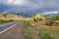 Road mountain rainbow forest cloudy Royalty Free Stock Photo