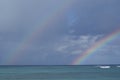 Rainbow over the Caribbean Sea after a tropical downpour over the island of Saona Royalty Free Stock Photo