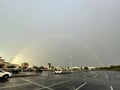 Beautiful rainbow over empty parking lot Royalty Free Stock Photo