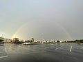 Beautiful rainbow over empty parking lot Royalty Free Stock Photo