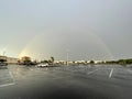 Beautiful rainbow over empty parking lot