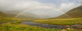 A beautiful rainbow in a wild landscape