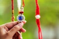 A Beautiful Rakhi With Blue Stone