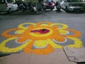 Beautiful rangoli design drawn by an artist on street of pune city