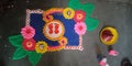 A beautiful rangoli design with lots of colours