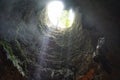 Beautiful ray of light inside Jomblang Cave