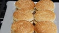 beautiful ready-made cheeseburgers on the stove